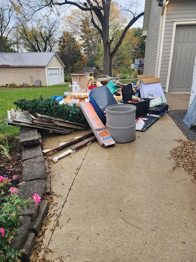 Dumpster being loaded with debris for 3 Yard Dumpster Rental in York